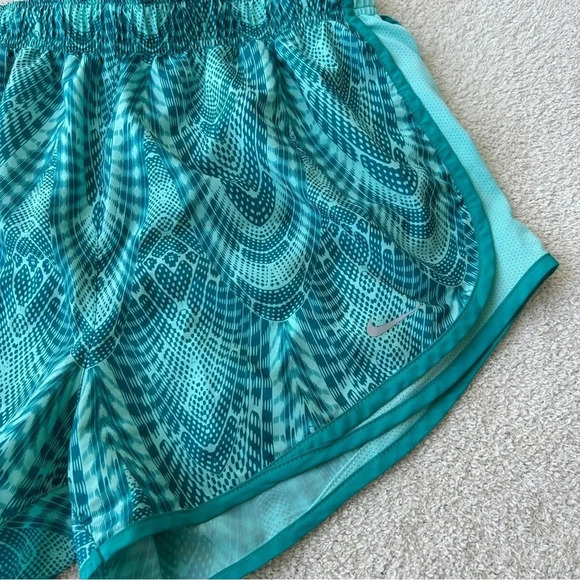 Women’s Nike Dri Fit Teal & Turquoise All Over Kaleidoscope Print Running Shorts - Picture 4 of 8